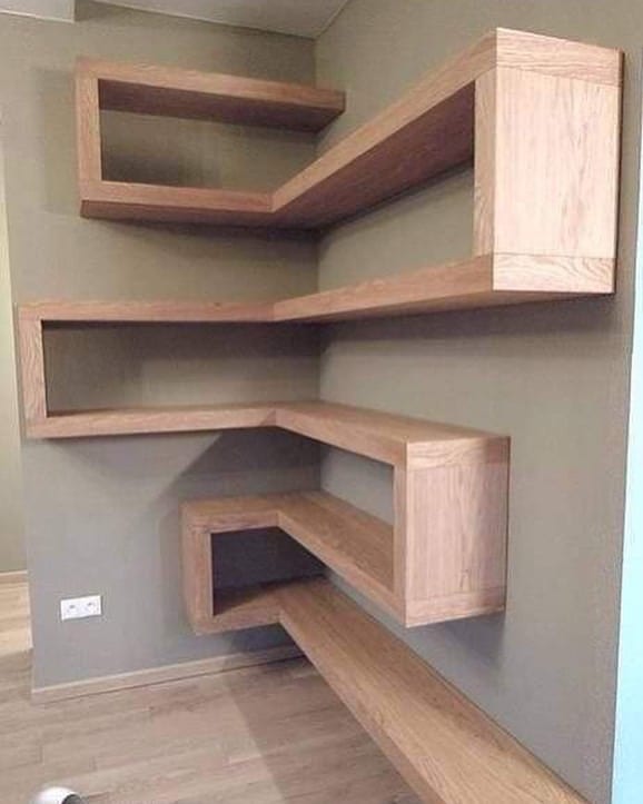 Floating oak corner shelves in a staggered zigzag arrangement